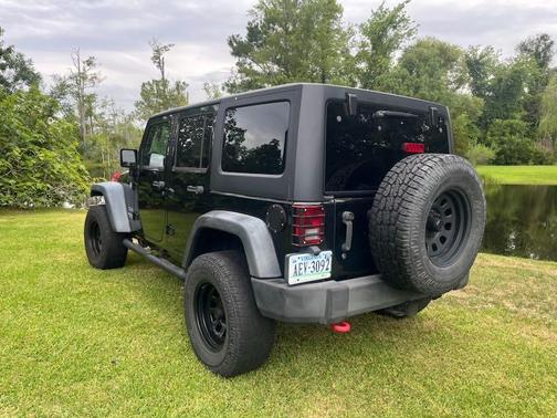 Black 2014 Jeep Wrangler Unlimited Sport