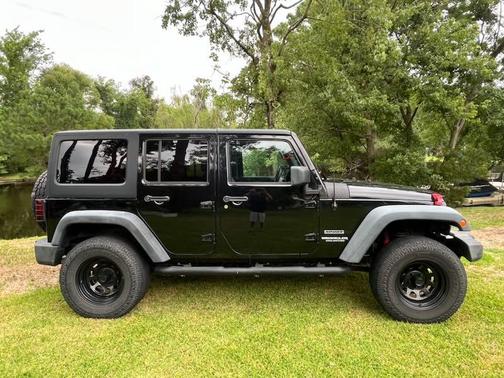 Black 2014 Jeep Wrangler Unlimited Sport