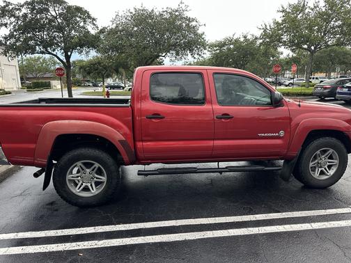 Red 2013 Toyota Tacoma PreRunner