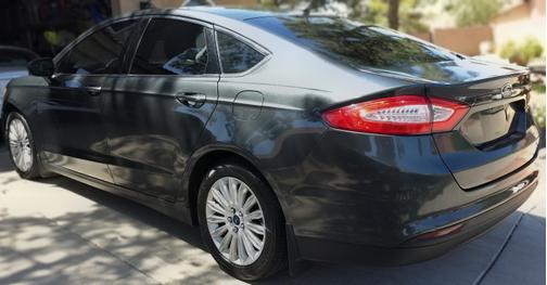 Green 2015 Ford Fusion Hybrid S