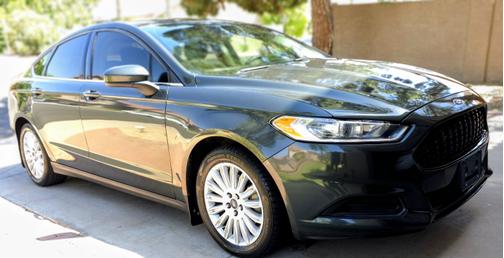 Green 2015 Ford Fusion Hybrid S