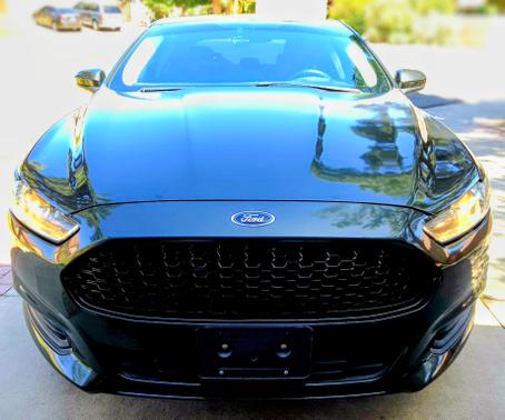 Green 2015 Ford Fusion Hybrid S