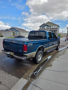 Blue 2000 Ford F-250 Lariat Crew Cab Super Duty