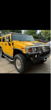 Yellow 2005 Hummer H2 Base