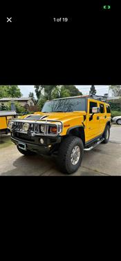 Yellow 2005 Hummer H2 Base