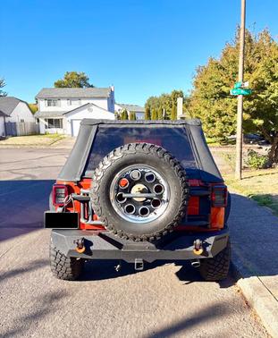 Orange 2009 Jeep Wrangler Unlimited Sahara