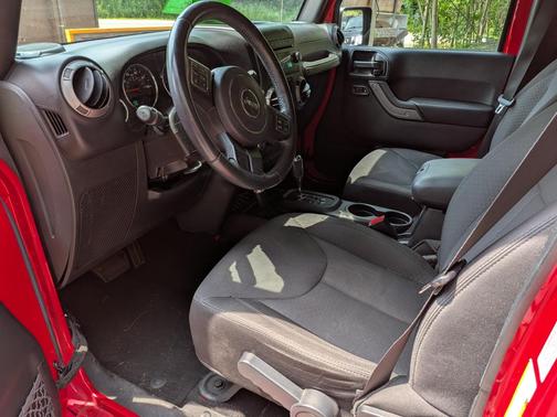 Red 2016 Jeep Wrangler Unlimited Sport