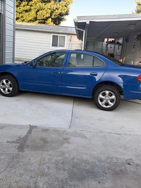 Blue 2000 Oldsmobile Alero GL