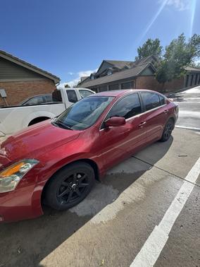 Red 2009 Nissan Altima 2.5 SL
