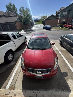Red 2009 Nissan Altima 2.5 SL