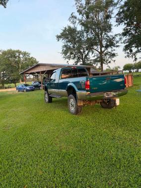 Blue 2000 Ford F-250 Lariat SuperCab Super Duty