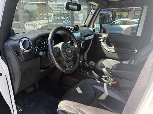 White 2014 Jeep Wrangler Unlimited Sahara