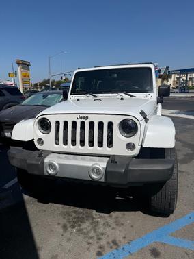 White 2014 Jeep Wrangler Unlimited Sahara