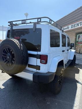 White 2014 Jeep Wrangler Unlimited Sahara