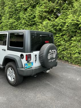 White 2014 Jeep Wrangler Unlimited Sport