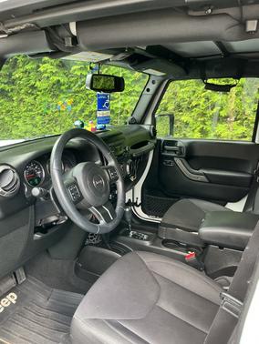 White 2014 Jeep Wrangler Unlimited Sport