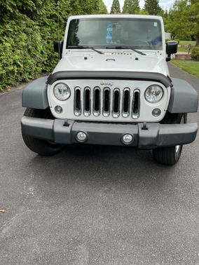 White 2014 Jeep Wrangler Unlimited Sport