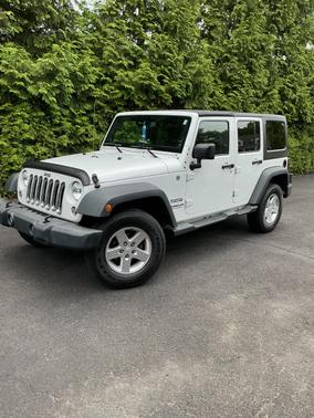 White 2014 Jeep Wrangler Unlimited Sport