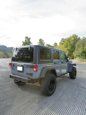 Gray 2015 Jeep Wrangler Unlimited Sport