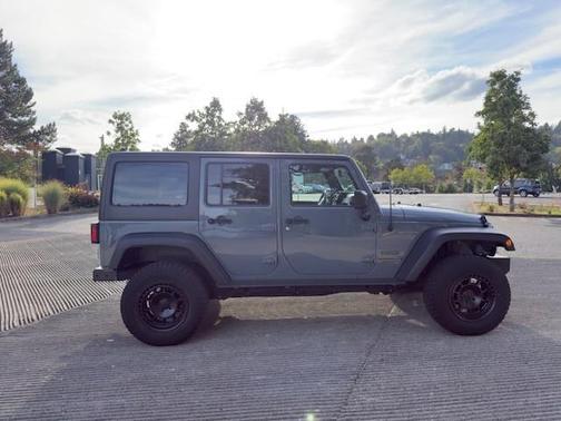 Gray 2015 Jeep Wrangler Unlimited Sport
