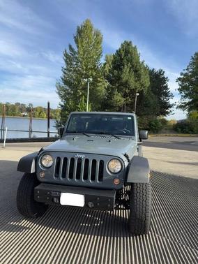 Gray 2015 Jeep Wrangler Unlimited Sport