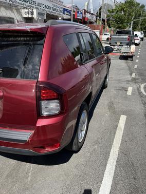 Red 2014 Jeep Compass Sport