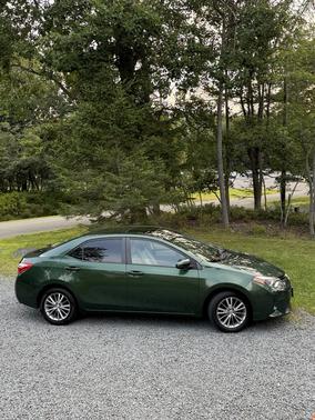Green 2015 Toyota Corolla LE Plus