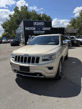 Beige 2015 Jeep Grand Cherokee Overland
