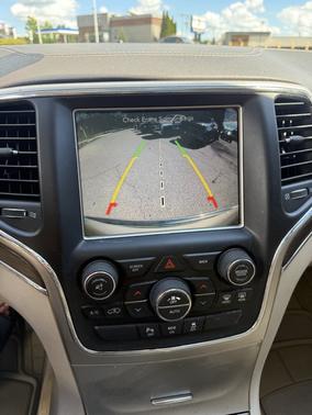 Beige 2015 Jeep Grand Cherokee Overland