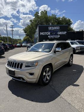 Beige 2015 Jeep Grand Cherokee Overland
