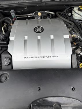 Brown 2004 Cadillac DeVille Base