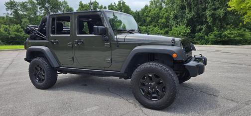 Green 2015 Jeep Wrangler Unlimited Willys Wheeler