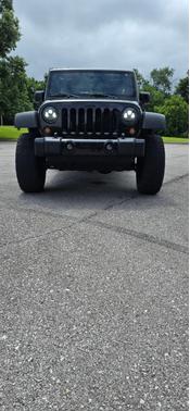 Green 2015 Jeep Wrangler Unlimited Willys Wheeler