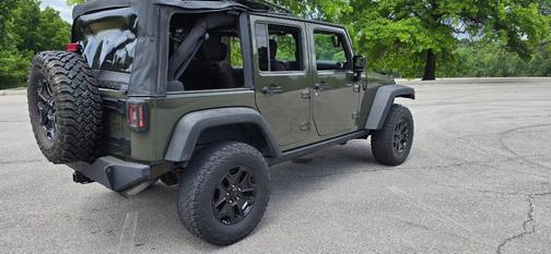 Green 2015 Jeep Wrangler Unlimited Willys Wheeler