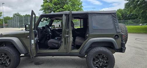 Green 2015 Jeep Wrangler Unlimited Willys Wheeler