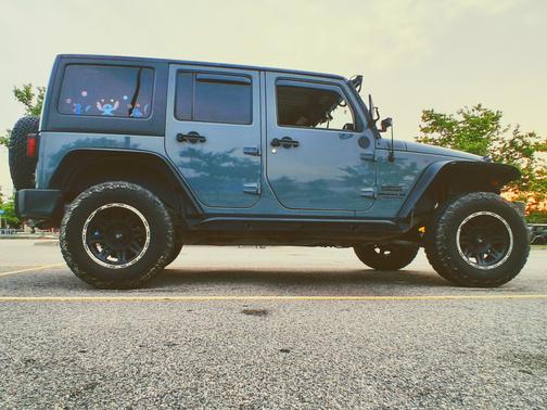 Blue 2014 Jeep Wrangler Unlimited Sport