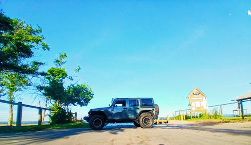 Blue 2014 Jeep Wrangler Unlimited Sport