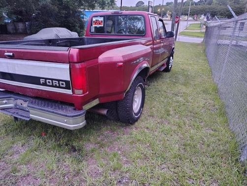 Red 1995 Ford F-350 XL SuperCab DRW