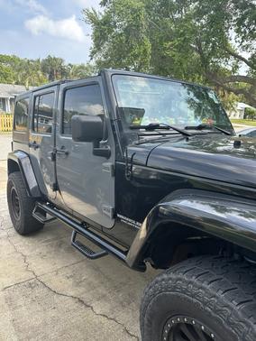Black 2014 Jeep Wrangler Unlimited Sahara