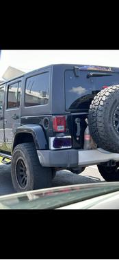 Black 2014 Jeep Wrangler Unlimited Sahara