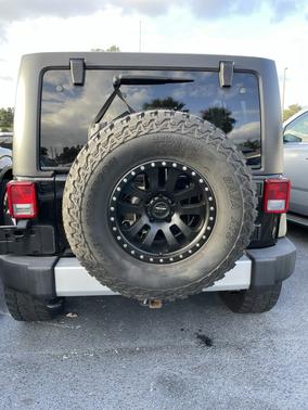 Black 2014 Jeep Wrangler Unlimited Sahara