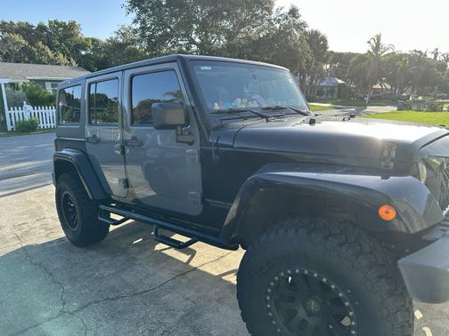 Black 2014 Jeep Wrangler Unlimited Sahara