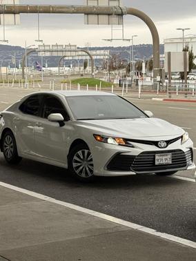 White 2022 Toyota Camry Hybrid LE