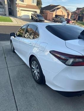 White 2022 Toyota Camry Hybrid LE