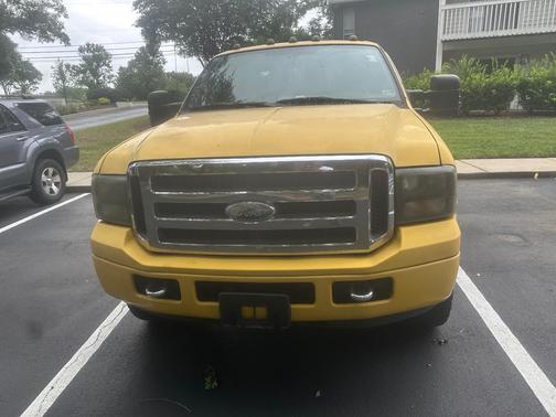 Yellow 2006 Ford F-250 Lariat Crew Cab Super Duty