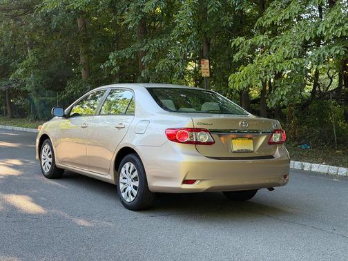 Beige 2012 Toyota Corolla LE