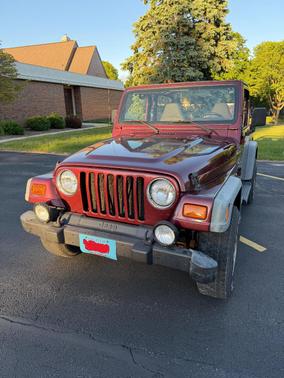 Red 2001 Jeep Wrangler Sport