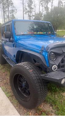 Blue 2015 Jeep Wrangler Unlimited Sport