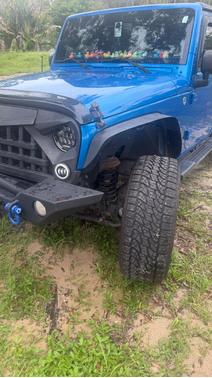 Blue 2015 Jeep Wrangler Unlimited Sport