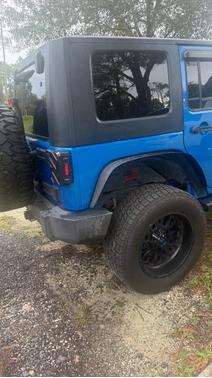 Blue 2015 Jeep Wrangler Unlimited Sport
